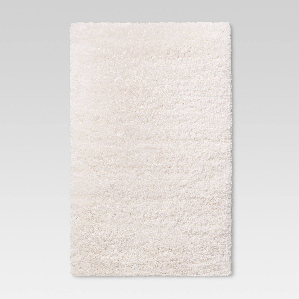 4'x5'6" Cream Plush Shag Washable Accent Rug - Room Essentials